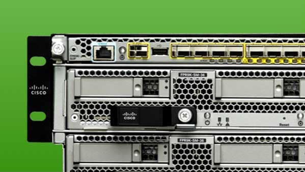 A close up of three servers with green background