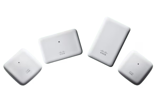 A group of four white devices sitting in front of each other.