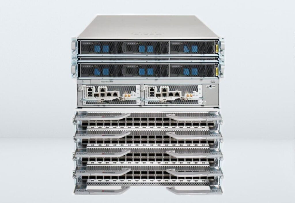 A stack of four servers with one stacked on top.